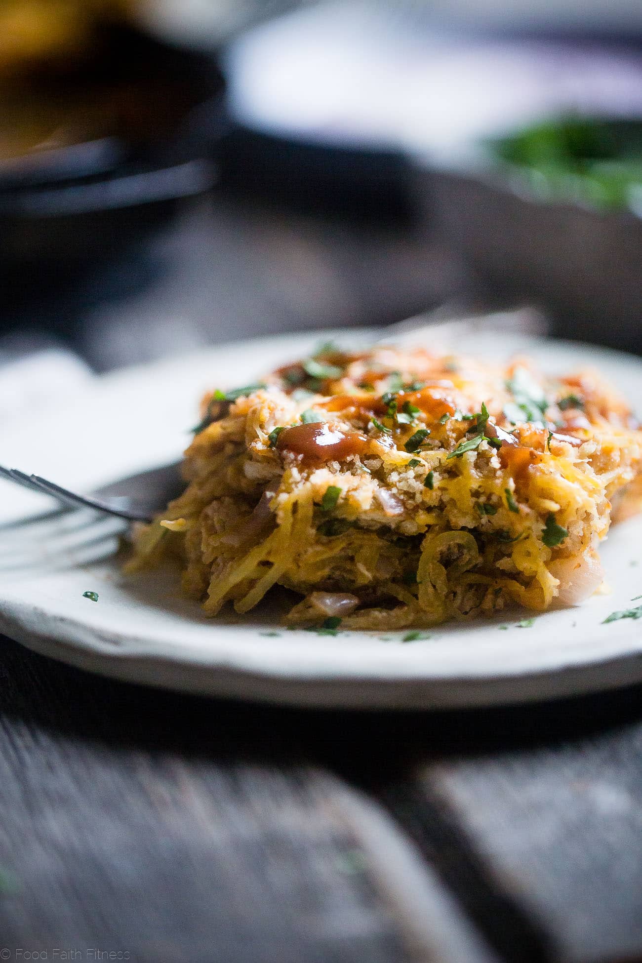 BBQ Baked Chicken Spaghetti Squash Casserole - This low carb, gluten free spaghetti squash and chicken casserole is cheesy, flavorful and only 214 calories! It's a kid-friendly, weeknight meal that the whole family will love! | Foodfaithfitness.com | @FoodfaithFit