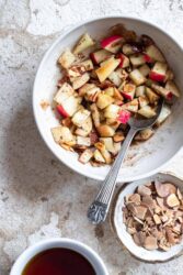 Mixing diced apples, slivered almonds, maple syrup, ginger, and cinnamon for Brie Grilled Cheese with Apples.