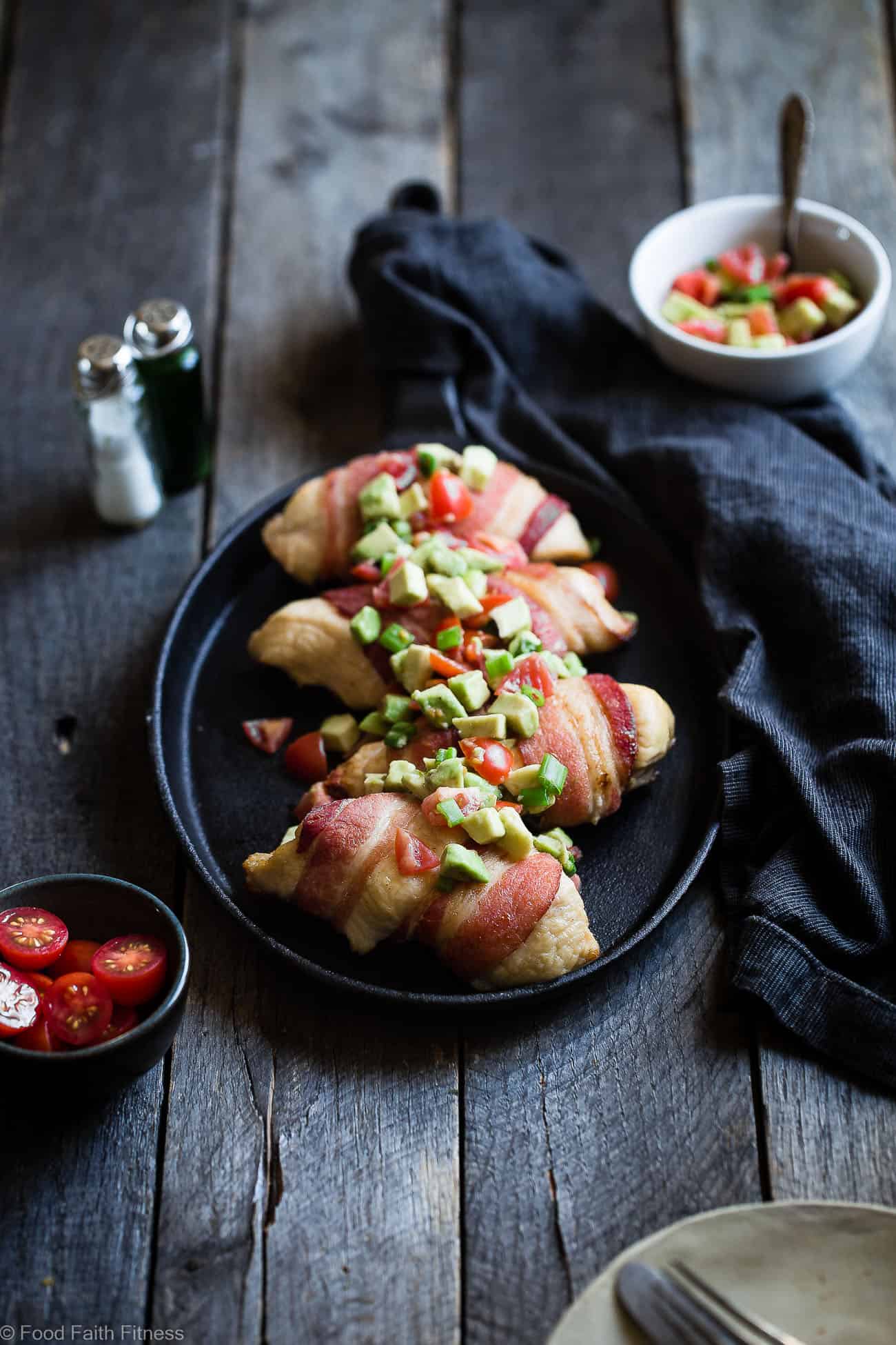Whole30 Oven Baked Bacon Wrapped Chicken Recipe - with a CREAMY, addicting avocado salsa, this is one quick and easy, kid friendly dinner that's paleo, keto and whole30 compliant! | Foodfaithfitness.com | @FoodFaithFit