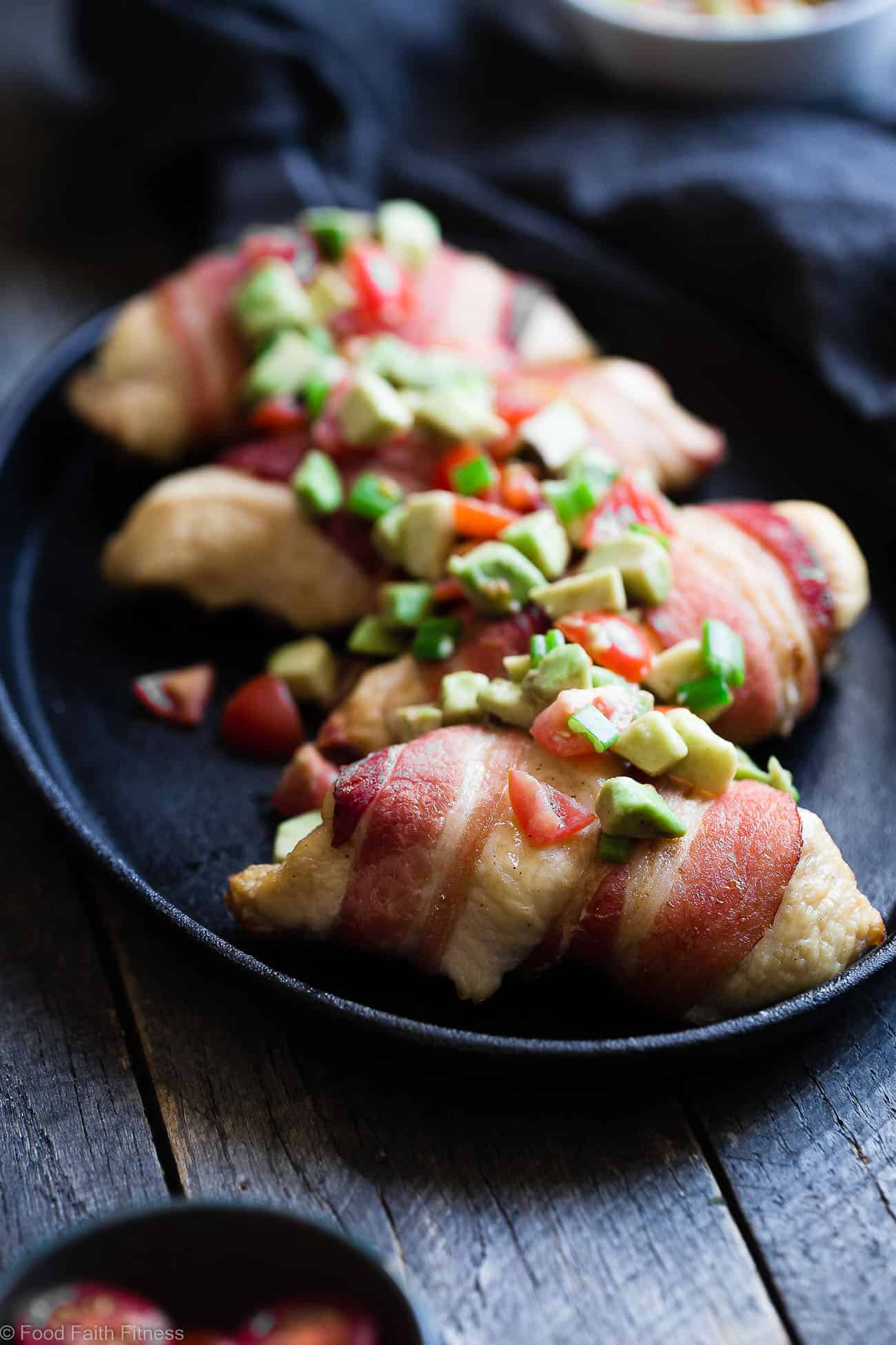 Whole30 Oven Baked Bacon Wrapped Chicken Breast - with a CREAMY, addicting avocado salsa, this is one quick and easy, kid friendly dinner that's paleo, keto and whole30 compliant! | Foodfaithfitness.com | @FoodFaithFit