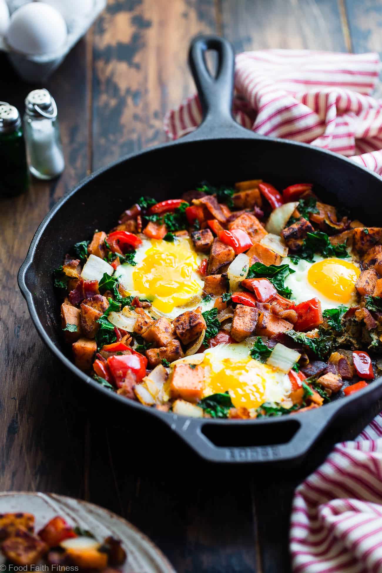 Healthy Paleo Sweet Potato Breakfast Hash with Bacon -This 30 minute, paleo friendly sweet potato hash with eggs makes a quick, delicious and healthy breakfast that is gluten/grain/dairy/sugar free and only 310 calories!| #Foodfaithfitness.com | #Paleo #Glutenfree #Whole30 #Healthy #Breakfast