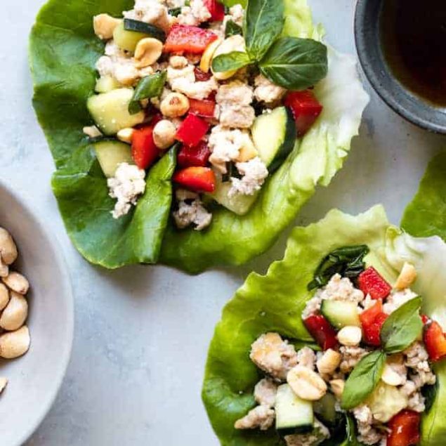 Low Carb Chicken Larb Gai Lettuce Wraps - An easy, healthy twist on a classic Thai salad! They're low carb, paleo friendly and super easy to make! Great for quick weeknight dinners! | #Foodfaithfitness | #glutenfree #lowcarb #paleo #healthy #Thai