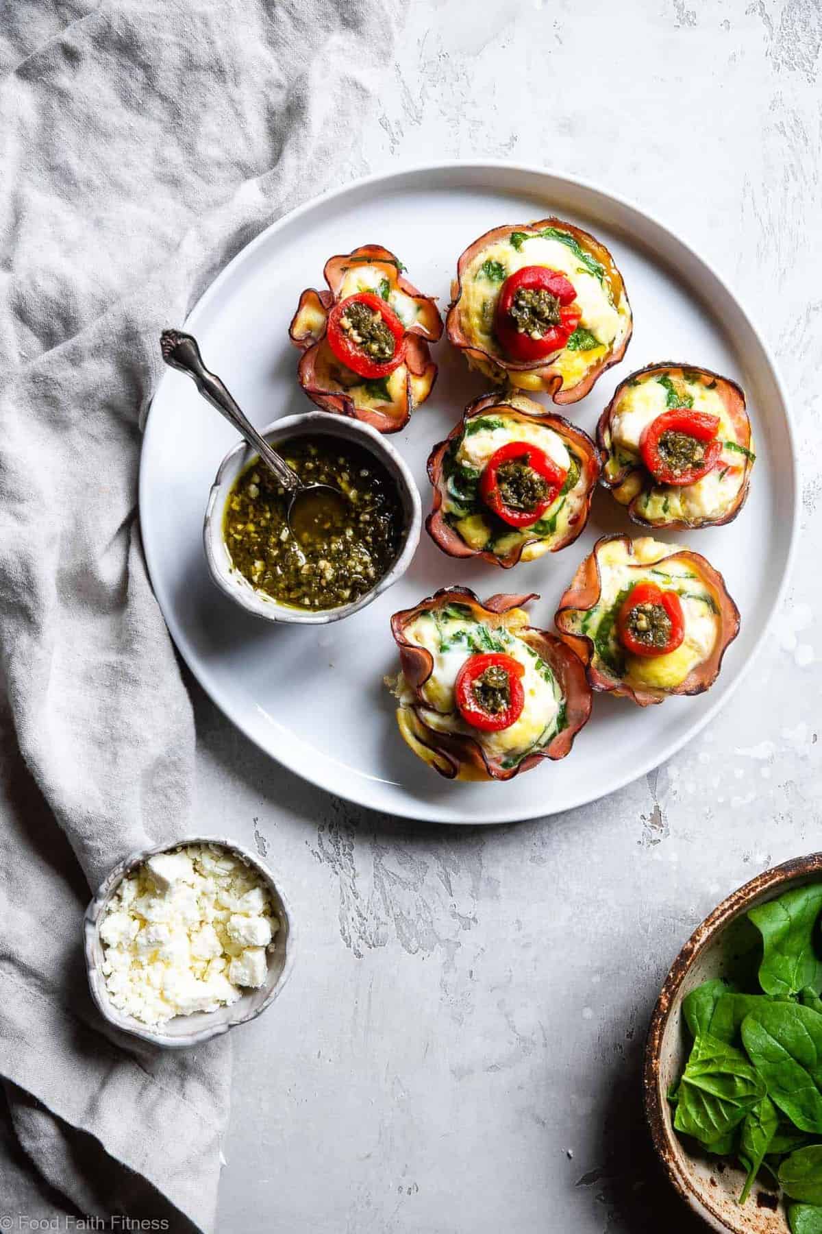 Mediterranean Keto Low Carb Egg Muffins - These easy, healthy egg muffins have a little Mediterranean flair and are packed with protein! A portable, healthy and gluten free breakfast or snack that is keto friendly and low carb! | #Foodfaithfitness | #Glutenfree #Keto #Lowcarb #Breakfast #Healthy Mediterranean Keto Low Carb Egg Muffins - These easy, healthy egg muffins have a little Mediterranean flair and are packed with protein! A portable, healthy and gluten free breakfast or snack that is keto friendly and low carb! | #Foodfaithfitness |
