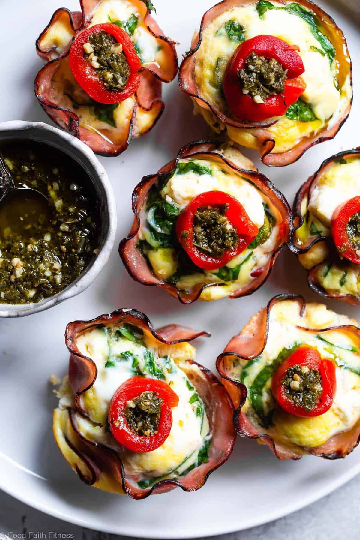 Mediterranean Keto Low Carb Egg Muffins - These easy, healthy egg muffins have a little Mediterranean flair and are packed with protein! A portable, healthy and gluten free breakfast or snack that is keto friendly and low carb! | #Foodfaithfitness | #Glutenfree #Keto #Lowcarb #Breakfast #Healthy Mediterranean Keto Low Carb Egg Muffins - These easy, healthy egg muffins have a little Mediterranean flair and are packed with protein! A portable, healthy and gluten free breakfast or snack that is keto friendly and low carb! | #Foodfaithfitness | #Glutenfree #Keto #Lowcarb #Breakfast #Healthy