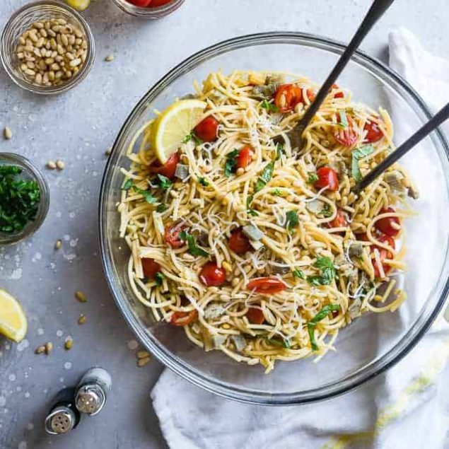 Gluten Free Lemon Artichoke Spaghetti Pasta Salad- A simple, healthy, vegan friendly pasta salad with creamy, roasted artichokes, bright fresh basil, garlic and lemon vinaigrette! Big flavors, so easy and great for Spring or Potlucks! | #Foodfaithfitness | #Vegan #Glutenfree #Healthy #Pastasalad #Dairyfree