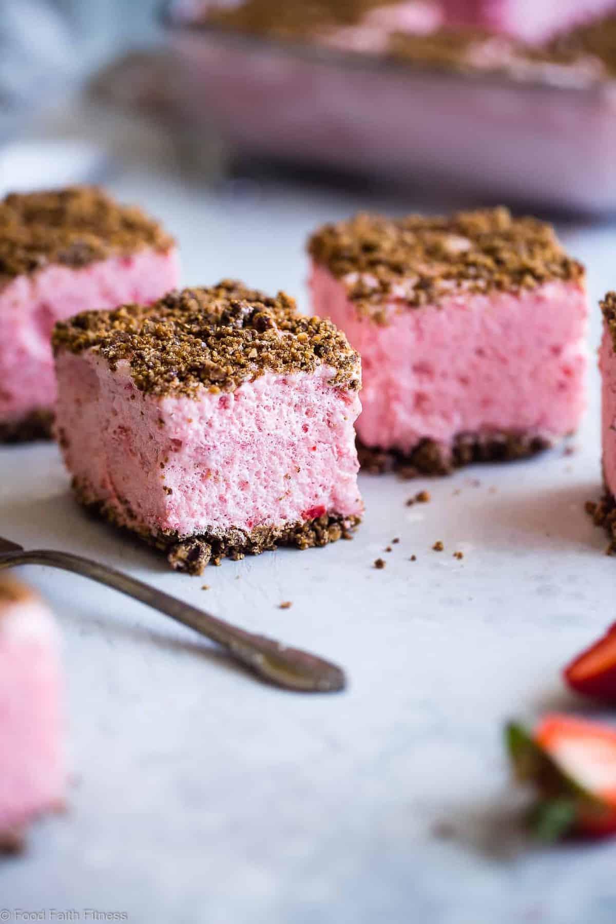 Strawberry Freeze - A low calorie, quick and easy, gluten free healthy Frozen Strawberry Dessert Recipe with a crunchy, pecan crumble! Always a hit with kids and adults and everyone always wants the recipe! | #Foodfaithfitness | #Glutenfree #Dairyfree #Healthy #Strawberries #Dessert