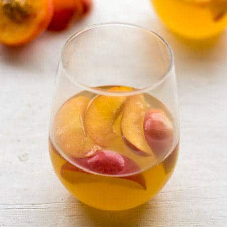 White Wine Cocktail with Peaches and Honey Fig Syrup {GF} - Food Faith Fitness