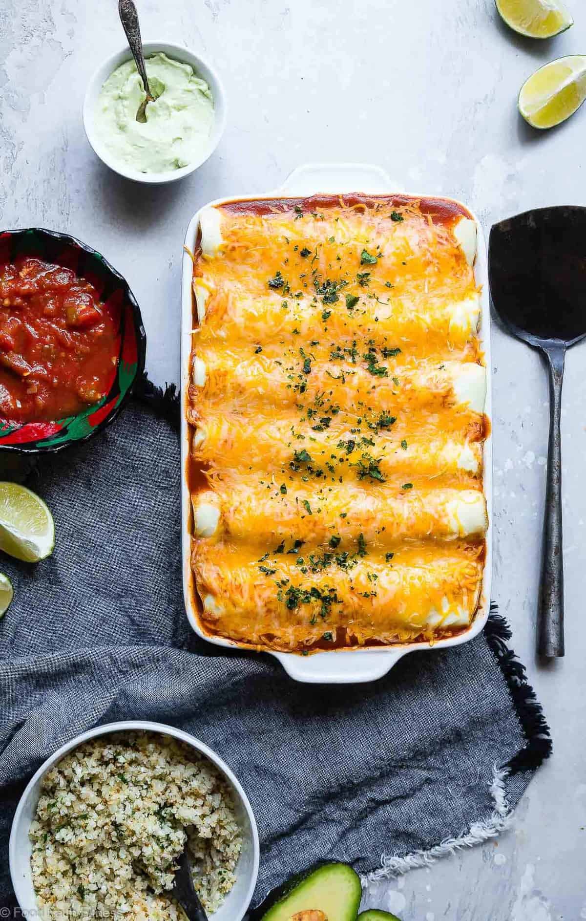 Healthy Low Carb Chicken Enchiladas - This gluten free Healthy Low Carb Chicken Enchilada Recipe uses a secret ingredient to make it low carb, protein PACKED and under 500 calories for a HUGE serving! These do NOT taste healthy and even picky eaters love them! | #Foodfaithfitness | #Lowcarb #Glutenfree #Healthy #Grainfree #Enchiladas Healthy Low Carb Chicken Enchiladas - This gluten free Healthy Low Carb Chicken Enchilada Recipe uses a secret ingredient to make it low carb, protein PACKED and under 500 calories for a HUGE serving! These do NOT taste healthy and even picky eaters love them! | #Foodfaithfitness | #Lowcarb #Glutenfree #Healthy #Grainfree #Enchiladas