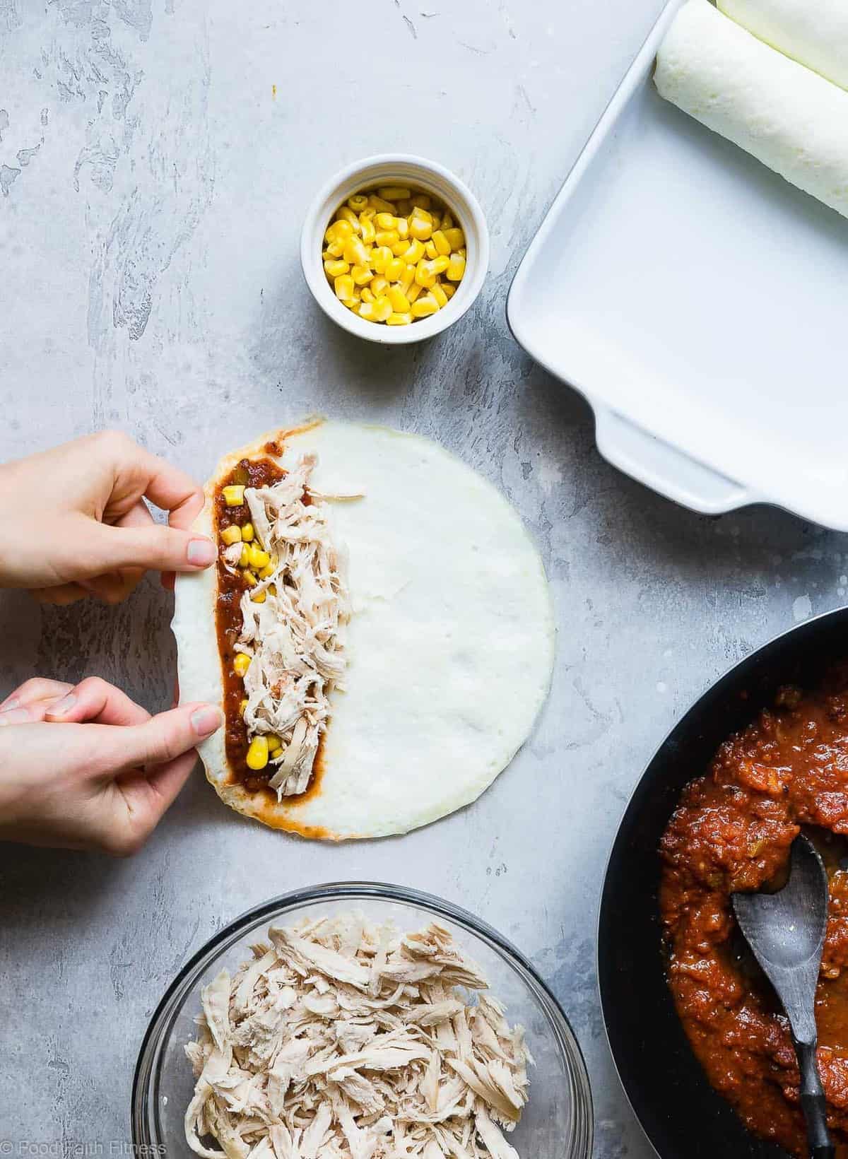 Healthy Gluten Free Chicken Enchiladas - This gluten free Healthy Low Carb Chicken Enchilada Recipe uses a secret ingredient to make it low carb, protein PACKED and under 500 calories for a HUGE serving! These do NOT taste healthy and even picky eaters love them! | #Foodfaithfitness | #Lowcarb #Glutenfree #Healthy #Grainfree #Enchiladas 