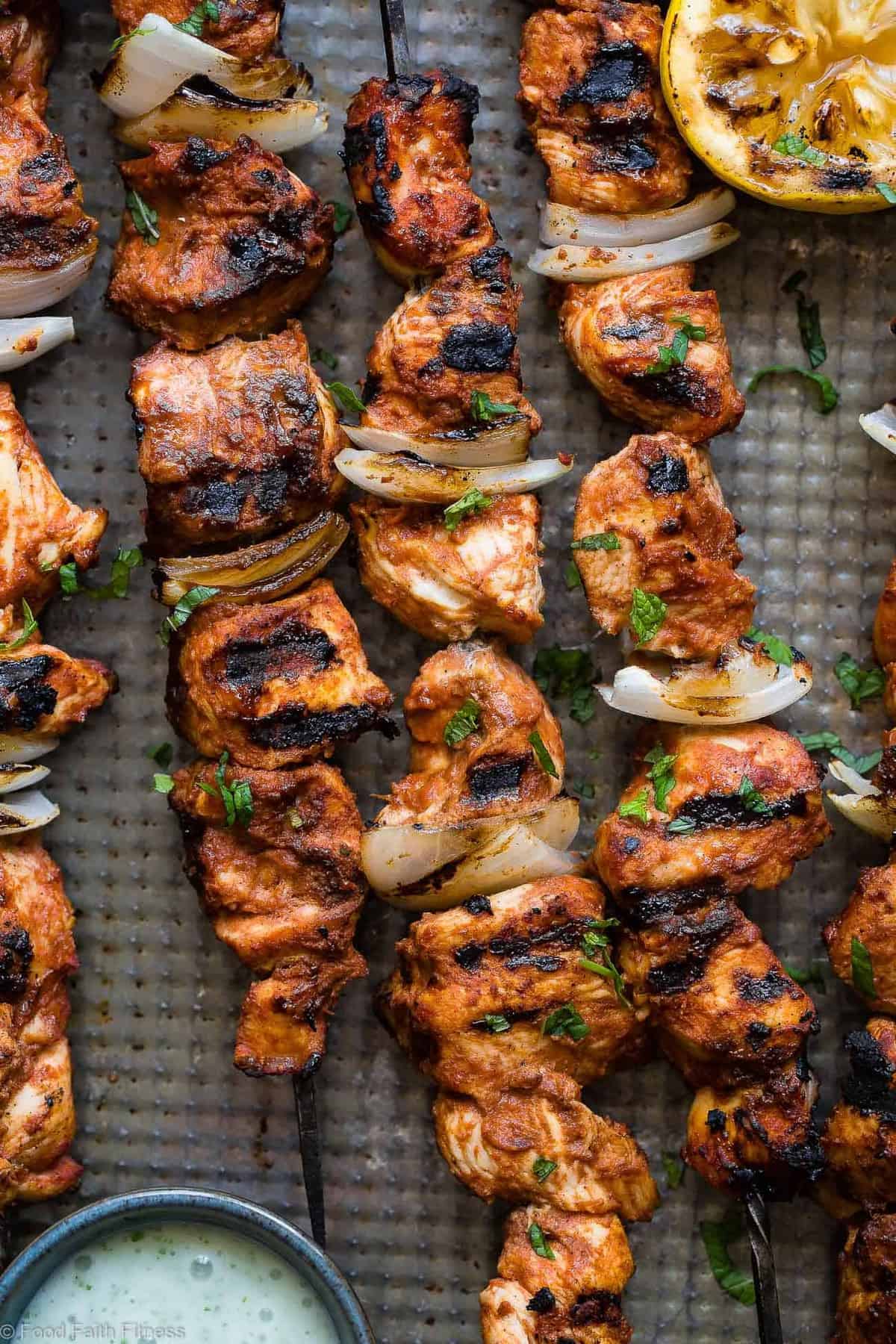 Grilled Moroccan Chicken Kebabs - These quick and easy, low carb Grilled Moroccan Chicken skewers are complete with a healthy, high protein yogurt mint sauce! Gluten free, only 1 Weight Watchers Freestlye point and SO delicious! | #Foodfaithfitness | #Lowcarb #WeightWatchers #Glutenfree #Healthy #Grilling Grilled Moroccan Chicken Kebabs - These quick and easy, low carb Grilled Moroccan Chicken skewers are complete with a healthy, high protein yogurt mint sauce! Gluten free, only 1 Weight Watchers Freestlye point and SO delicious! | #Foodfaithfitness | #Lowcarb #WeightWatchers #Glutenfree #Healthy #Grilling