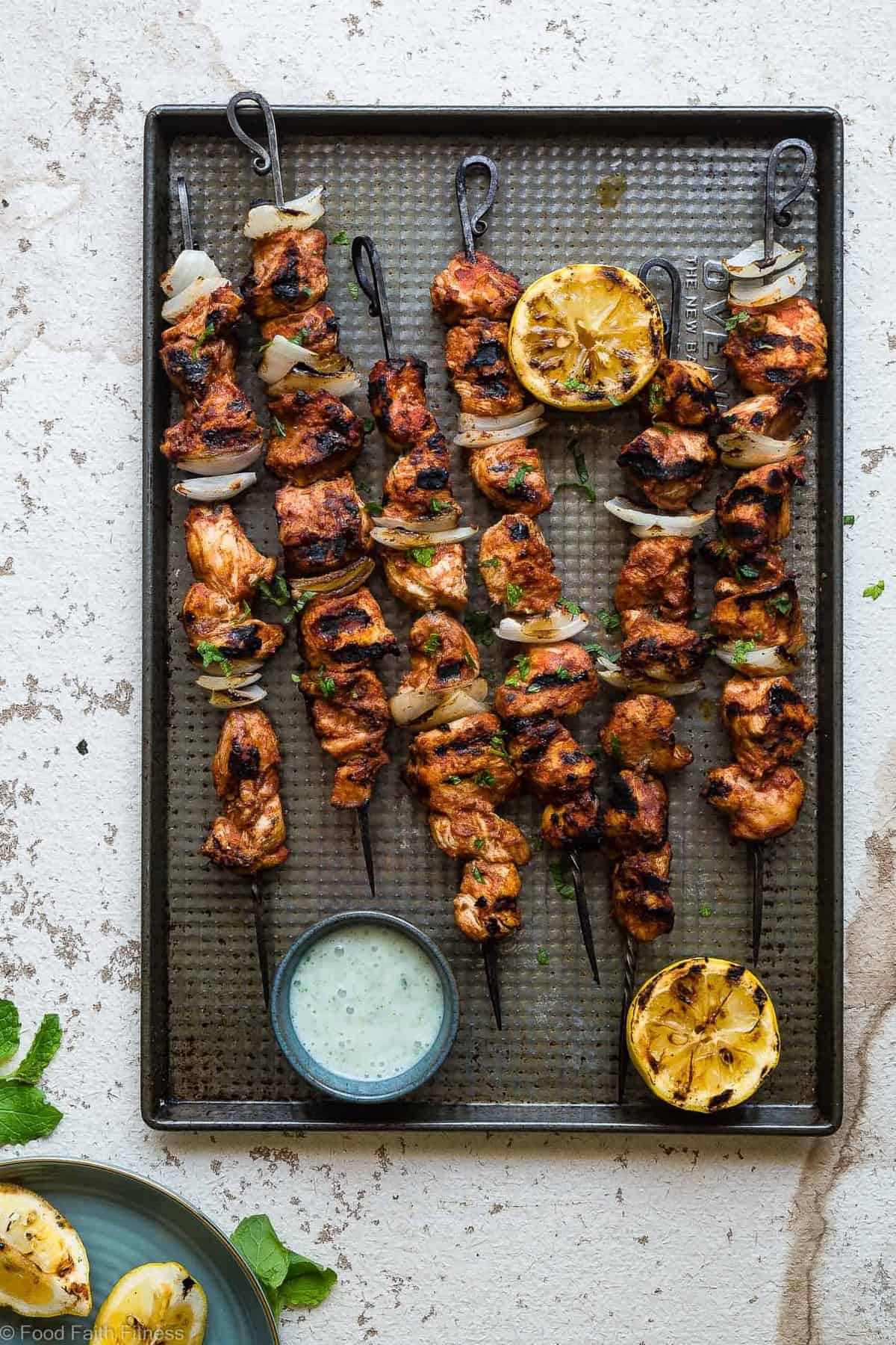 Grilled Moroccan Chicken Kebabs - These quick and easy, low carb Grilled Moroccan Chicken skewers are complete with a healthy, high protein yogurt mint sauce! Gluten free, only 1 Weight Watchers Freestlye point and SO delicious! | #Foodfaithfitness | #Lowcarb #WeightWatchers #Glutenfree #Healthy #Grilling Tomato Grilled Moroccan Chicken Kebabs - These quick and easy, low carb Grilled Moroccan Chicken skewers are complete with a healthy, high protein yogurt mint sauce! Gluten free, only 1 Weight Watchers Freestlye point and SO delicious! | #Foodfaithfitness | #Lowcarb #WeightWatchers #Glutenfree #Healthy #Grilling
