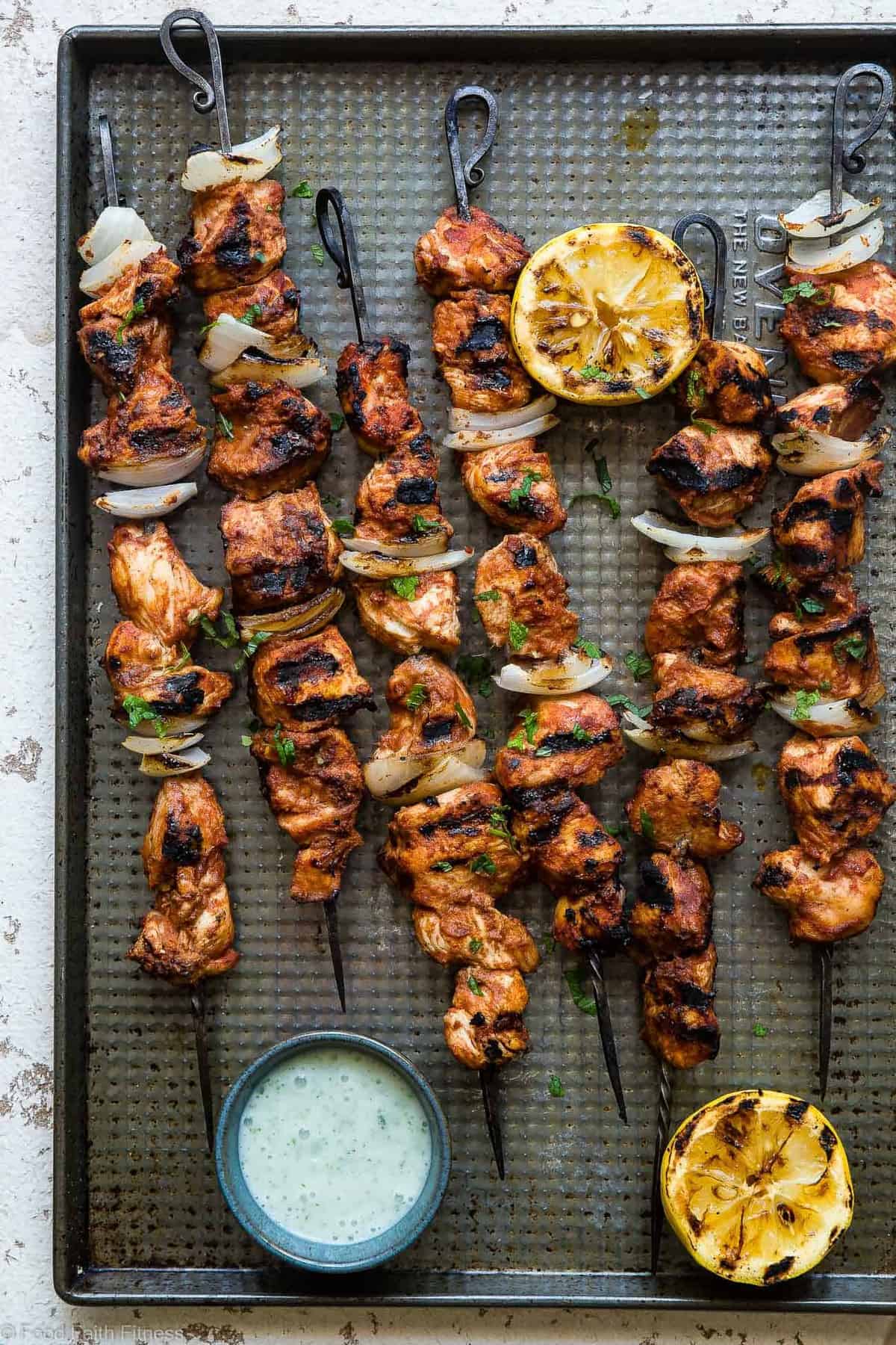 Grilled Moroccan Chicken Kebabs - These quick and easy, low carb Grilled Moroccan Chicken skewers are complete with a healthy, high protein yogurt mint sauce! Gluten free, only 1 Weight Watchers Freestlye point and SO delicious! | #Foodfaithfitness | #Lowcarb #WeightWatchers #Glutenfree #Healthy #Grilling Grilled Moroccan Chicken Kebabs - These quick and easy, low carb Grilled Moroccan Chicken skewers are complete with a healthy, high protein yogurt mint sauce! Gluten free, only 1 Weight Watchers Freestlye point and SO delicious! | #Foodfaithfitness | #Lowcarb #WeightWatchers #Glutenfree #Healthy #Grilling