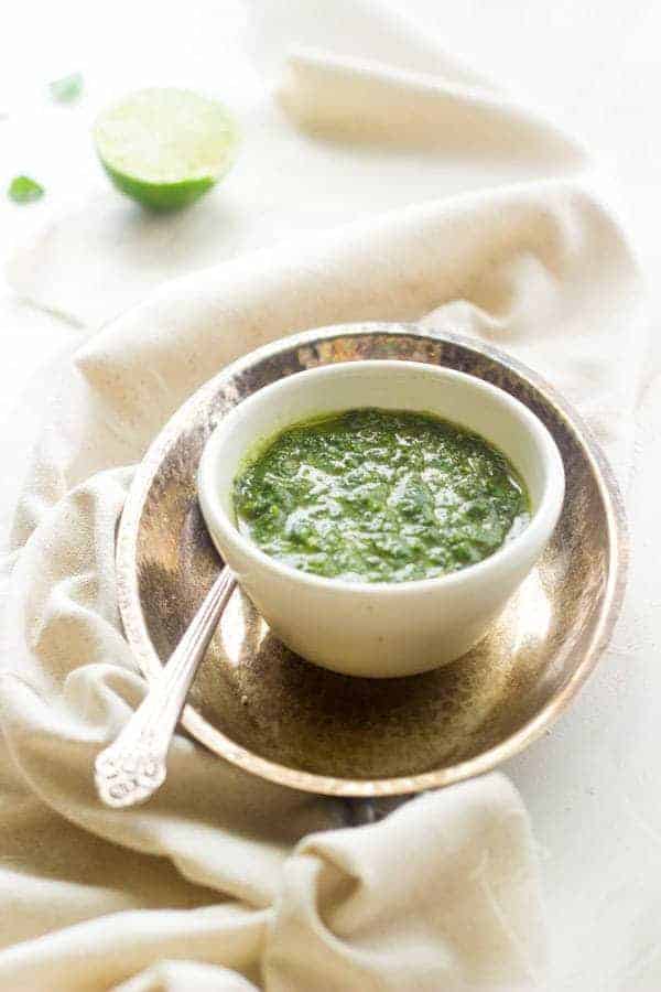 Kale Chimichurri - A quick and easy sauce that is GREAT on meat! |www.foodfaithfitness.com| #glutenfree #recipe #kale
