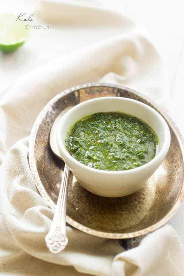 Kale Chimichurri - A quick and easy sauce that is GREAT on meat! |www.foodfaithfitness.com| #glutenfree #recipe #kale