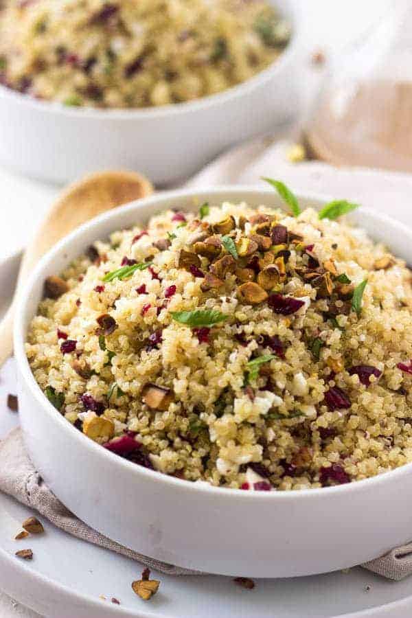Pistachio Cherry And Feta Quinoa Salad - Crunchy, sweet and tangy this is SO easy and delicious! |www.foodfaithfitness.com| #Recipe #Quinoa #Salad