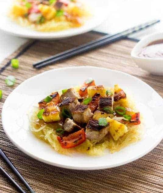 Grilled Sweet and Sour Pork with Spaghetti Squash - A healthy twist on a classic. You won't miss the fried version! | Foodfaithfitness.com | #recipe #spaghettisquash #pork