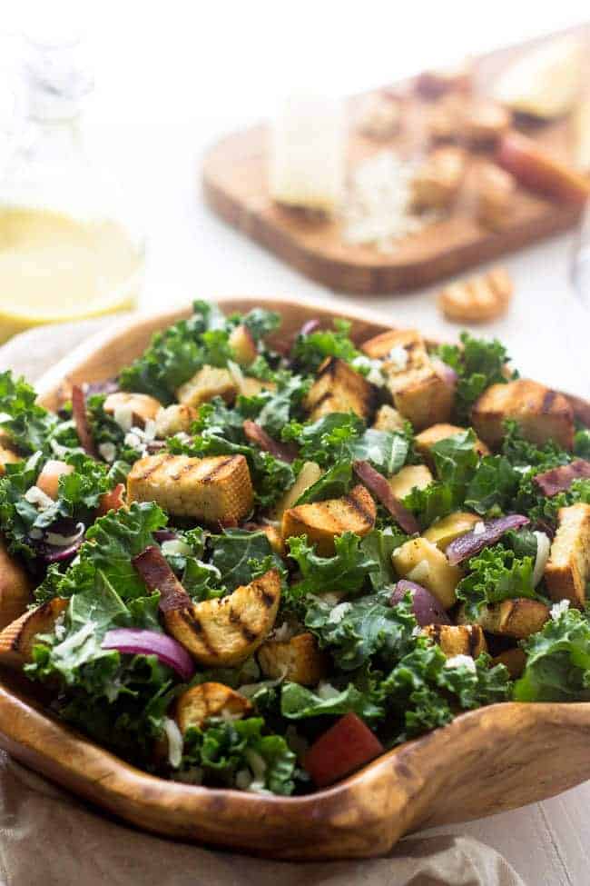Grilled Kale Panzanella Salad - With THE BEST smokey honey mustard vinaigrette! | Foodfaithfitness.com | #salad #kale #recipe