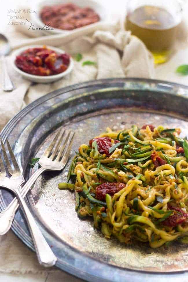 Raw Sundried Tomato Sauce with Zucchini Noodles - An easy meal that is big on flavor, but not on calories! | Foodfaithfitness.com | #raw #vegan #recipe #zucchinoodles