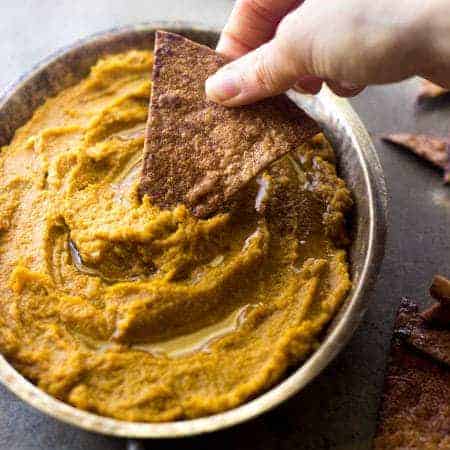 Pumpkin Pie Hummus with Baked Cinnamon "Sugar" Tortilla Chips - Healthy, Easy and tastes like pumpkin pie! | Foodfaithfitness.com | #pumpkin #recipe #healthysnack #hummus