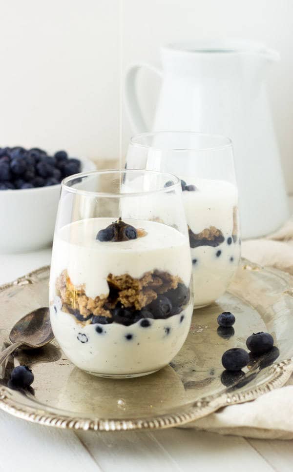 Gluten Free Pancake Parfaits - Pancakes are layered with blueberries and Greek yogurt for a fun and healthy #breakfast! | Foodfaithfitness.com | #recipe #pancake #Glutenfree