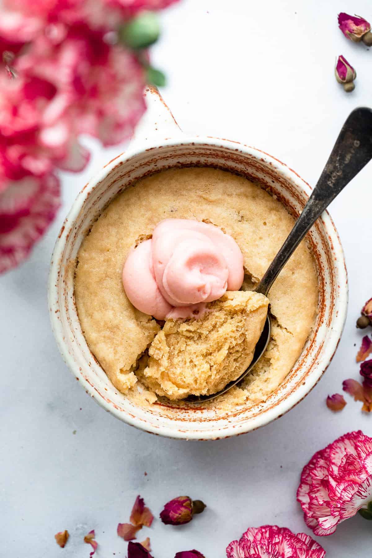 Strawberry Protein Mug Cake - This easy Microwave Strawberry Protein Mug Cake comes together in two minutes and is healthy, whole wheat, protein packed and SO fluffy! | #Foodfaithfitness | #healthy #mugcake #wholewheat #dessert Microwave Strawberry Protein Mug Cake