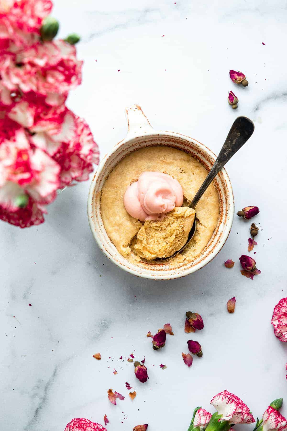 Strawberry Protein Mug Cake - This easy Microwave Strawberry Protein Mug Cake comes together in two minutes and is healthy, whole wheat, protein packed and SO fluffy! | #Foodfaithfitness | #healthy #mugcake #wholewheat #dessert protein powder cake