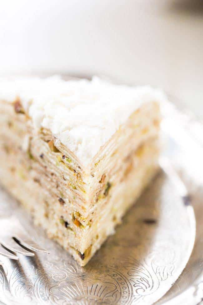 Coconut Pistachio Crepe Cake - A showstopping dessert that is surprisingly EASY! Perfect to impress at your Christmas table! | Foodfaithfitness.com | #recipe
