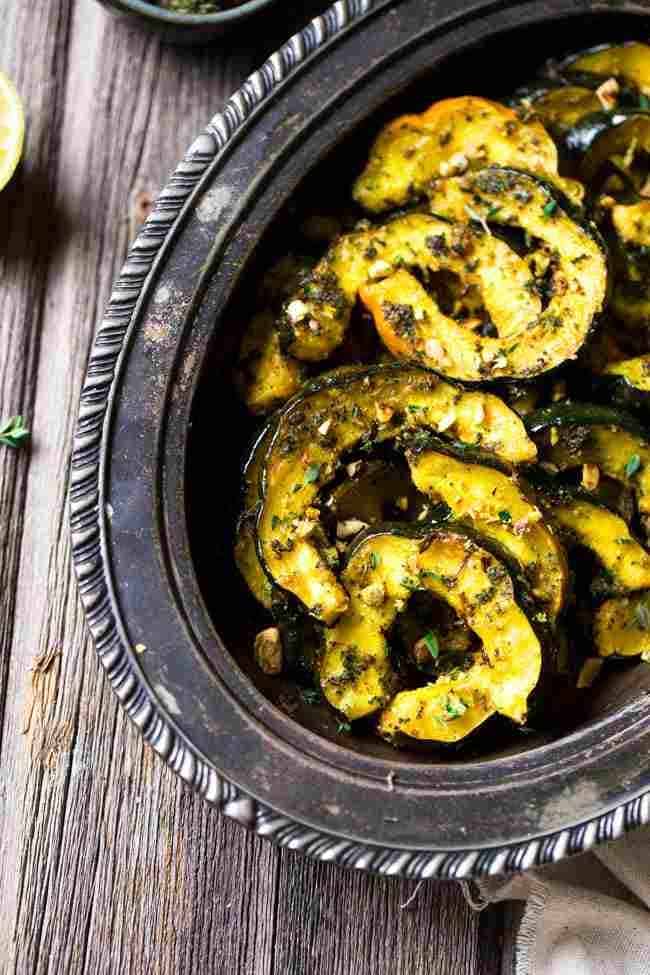 Pamesan Toasted Acorn Squash with Sage Kale Pesto - An easy side dish that is perfect for entertaining or a weeknight dinner! | Foodfaithfitness.com | #recipe