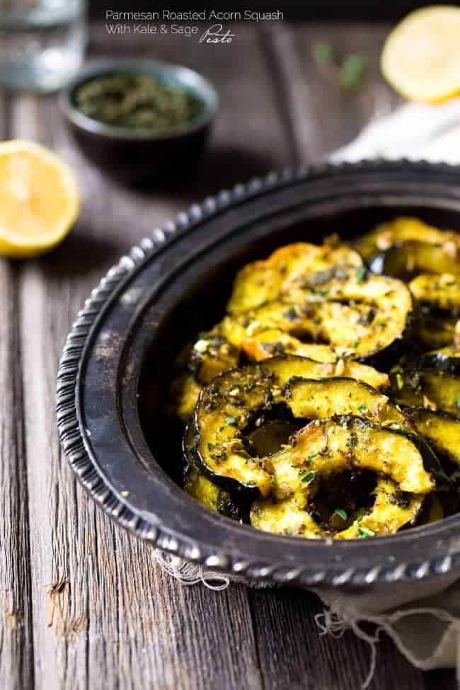 Pamesan Toasted Acorn Squash with Sage Kale Pesto - An easy side dish that is perfect for entertaining or a weeknight dinner! | Foodfaithfitness.com | #recipe