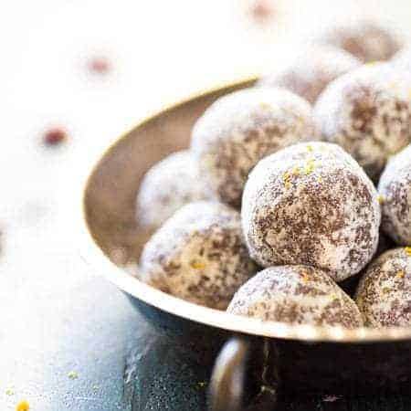 Cranberry Orange Energy Bites - Ready in 5 minutes, only 6 ingredients and gluten fee and paleo friendly! You NEED these! | Foodfaithfitness.com | #recipe