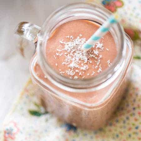 Vegan Strawberry Coconut Milk Smoothie - Made in 5 mins, only 5 ingredients and SO healthy and protein packed! | Foodfaithfitness.com | @FoodFaithFit