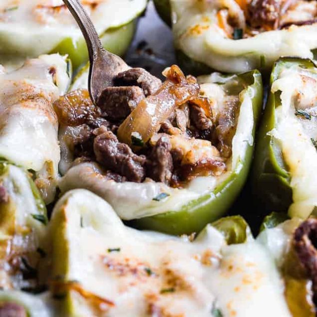 Low Carb Keto Philly Cheesesteak Stuffed Peppers - These stuffed peppers have all the flavors of your favorite sandwich in a healthy, low carb, easy weeknight meal that will please even picky eaters! Healthy comfort food at its best! | #Foodfaithfitness | #Glutenfree #Keto #Lowcarb #Healthy #Grainfree