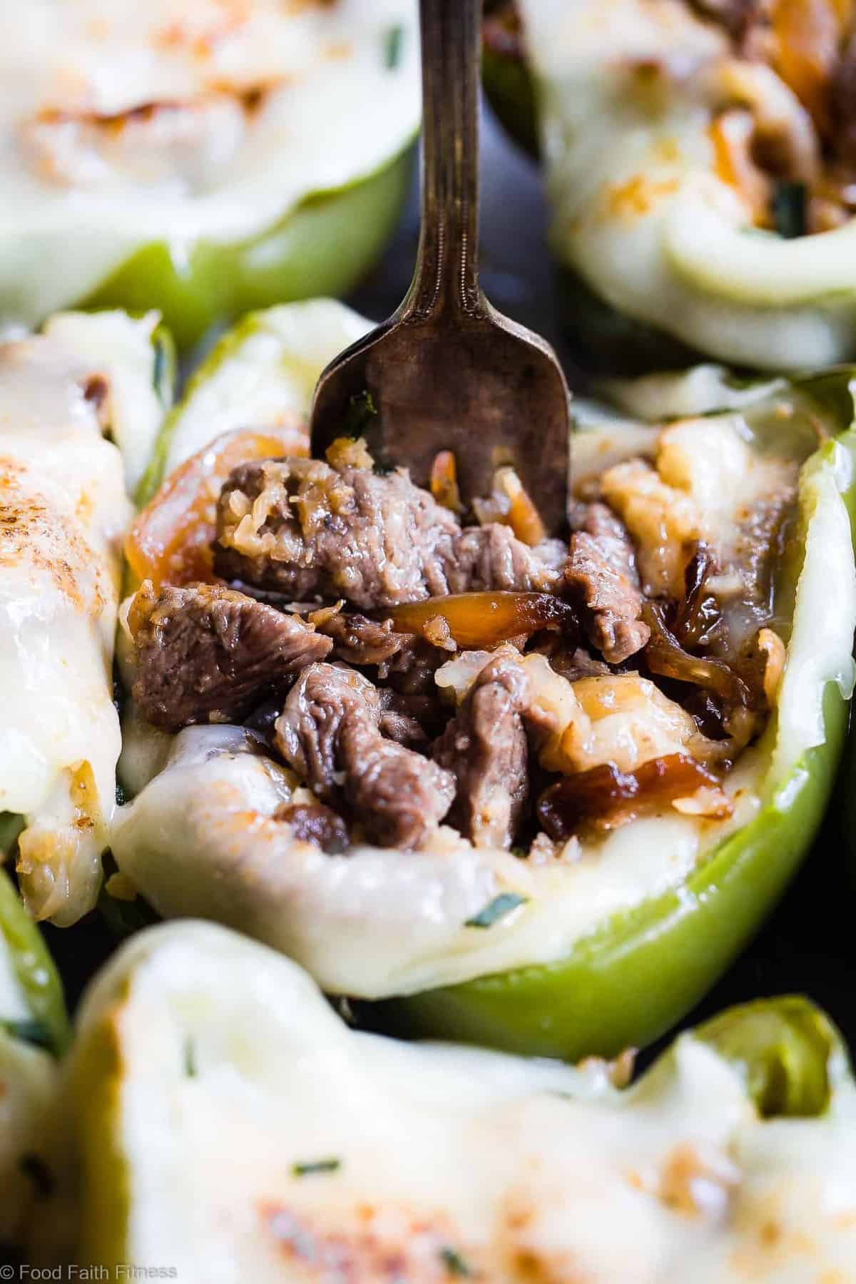 Low Carb Keto Philly Cheesesteak Stuffed Peppers - These stuffed peppers have all the flavors of your favorite sandwich in a healthy, low carb, easy weeknight meal that will please even picky eaters! Healthy comfort food at its best! | #Foodfaithfitness | #Glutenfree #Keto #Lowcarb #Healthy #Grainfree close up of one Cheesesteak Stuffed Peppers