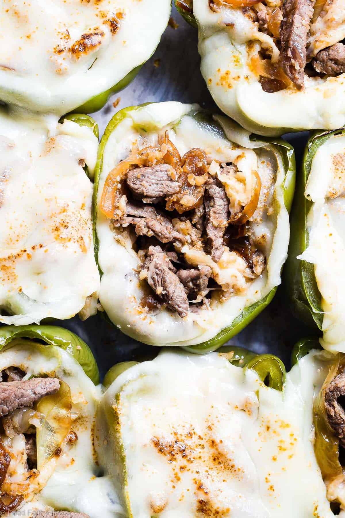 Cheesesteak Stuffed Peppers arranged on a backing sheet