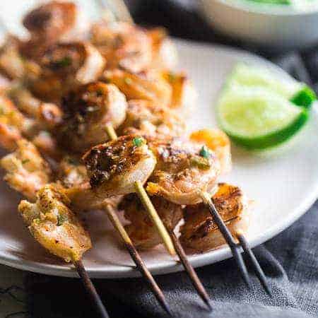 Cilantro Lime Grilled Shrimp with Avocado Cilantro Dip - Marinated in lime juice, honey and jalapeno pepper, then grilled for a quick and easy, healthy meal that's gluten free, low carb and low fat! | Foodfaithfitness.com | @FoodFaithFit