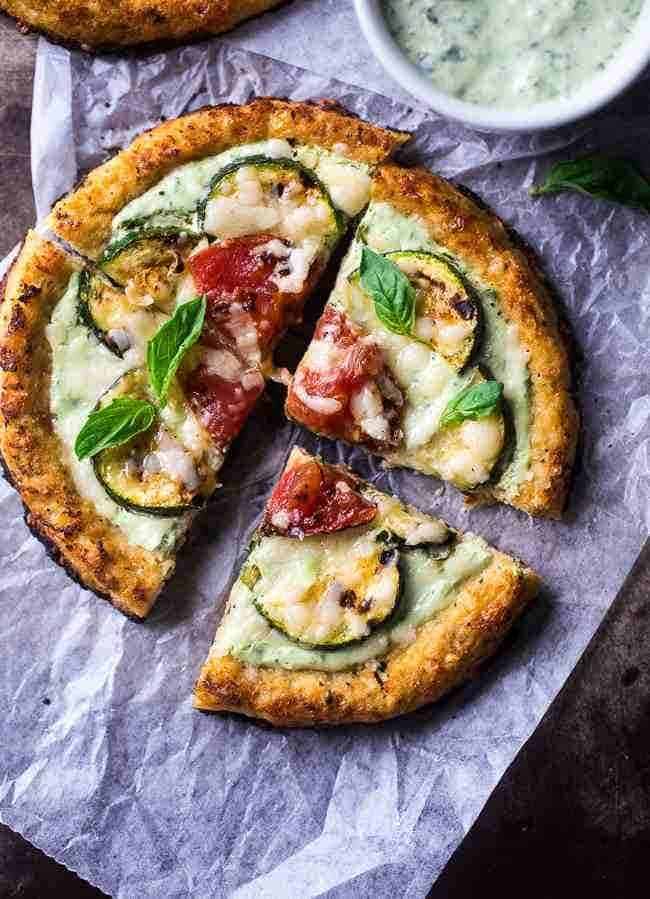 Grilled Veggie Cauliflower Pizza with Greek Yogurt Pesto - Low carb, high protein, meatless and under 350 calories! Learn the secret to cauliflower crust that doesn’t get soggy! | FoodFaithFitness.com | @FoodFaithFit