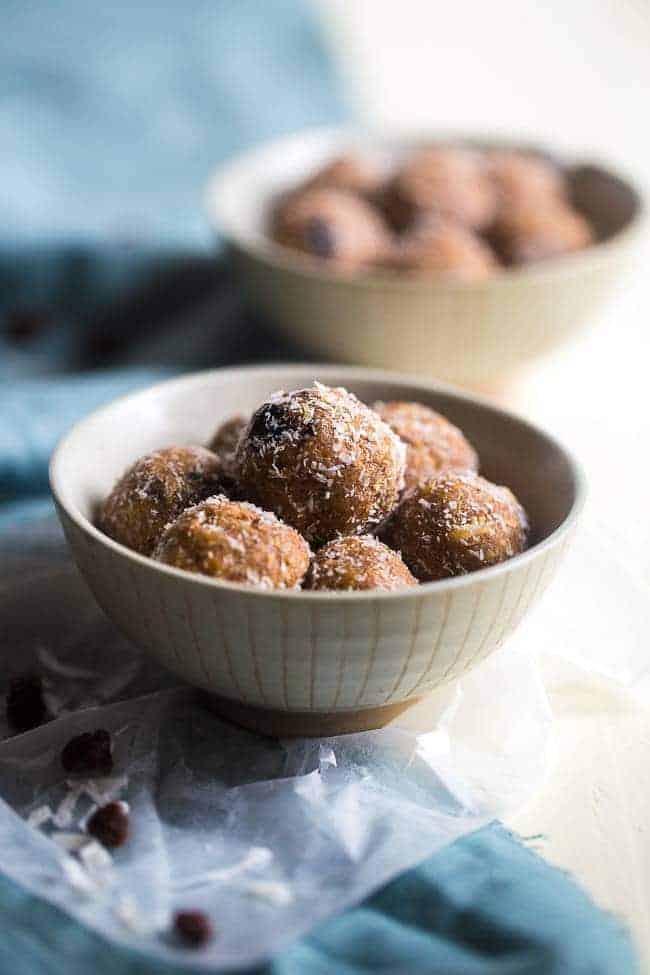 Paleo Coconut Rum Raisin Energy Balls - A quick and easy snack that are ready in only 10 minutes! A healthy, high protein and gluten free taste of the tropics to give you an energy boost! | Foodfaithfitness.com | @FoodFaithFit