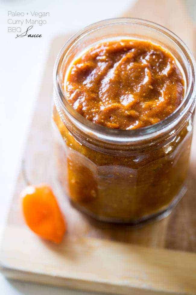Mango Curry Easy Homemade Paleo BBQ Sauce - This homemade BBQ sauce is naturally sweetened with dates and mangoes, and has a spicy curry kick! It's quick, easy, Paleo/Vegan-friendly and so healthy! Perfect for summer! | #Foodfaithfitness | #Paleo #Vegan #Healthy #Glutenfree #Sugarfreey and so healthy! Perfect for summer! | Foodfaithfitness.com | @FoodFaithFit