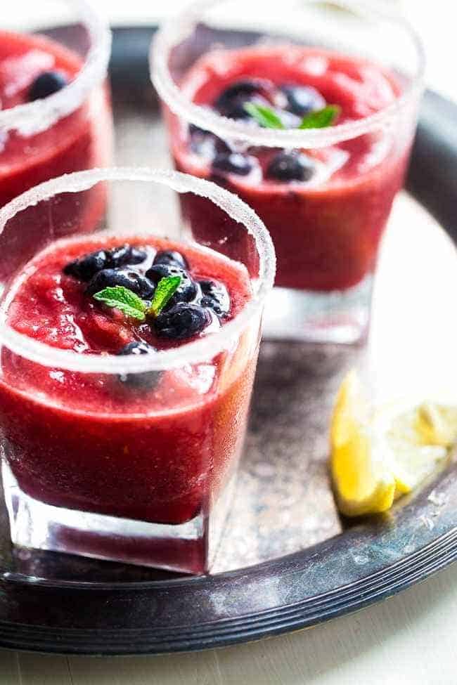 Skinny Blended Lemon Raspberry Mojito with Muddled Blueberries - Thick, frosty and SO refreshing for only 115 calories! Skinny summer drinking at it's best! | Foodfaithfitness.com | @FoodFaithFit