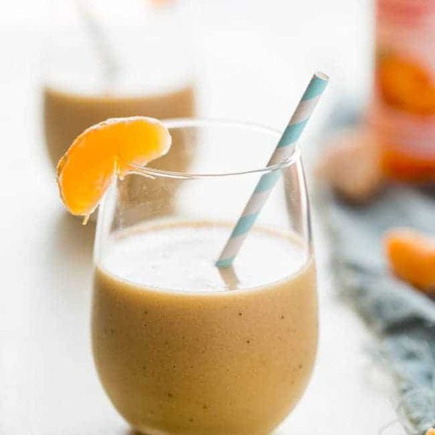 Banana Creamsicle Protein Smoothie - This orange smoothie is SO thick, creamy, and packed with vanilla protein powder so it tastes like a creamsicle! Ready in 5 minutes, loading with antioxidants and perfect for post workout recovery! | Foodfaithfitness.com | @FoodFaithFit