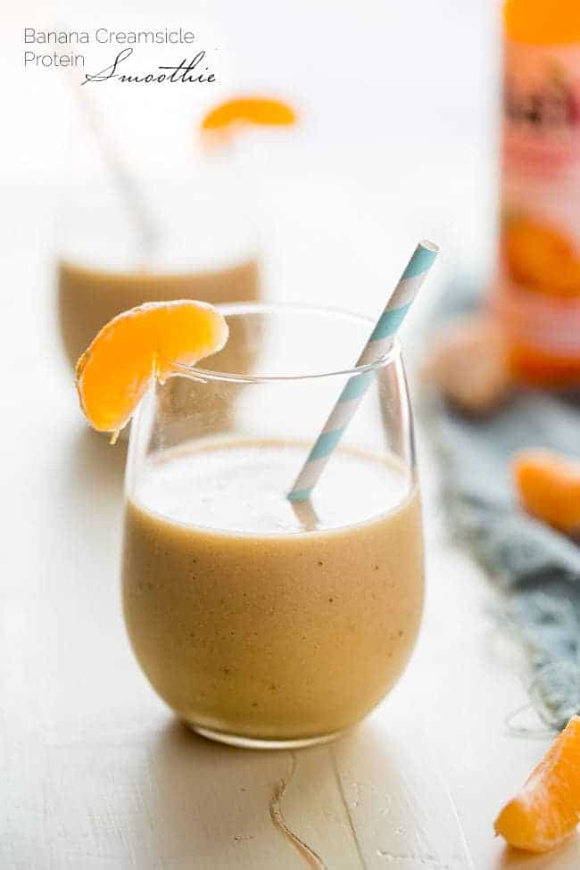 Banana Creamsicle Protein Smoothie - This orange smoothie is SO thick, creamy, and packed with vanilla protein powder so it tastes like a creamsicle! Ready in 5 minutes, loading with antioxidants and perfect for post workout recovery! | Foodfaithfitness.com | @FoodFaithFit