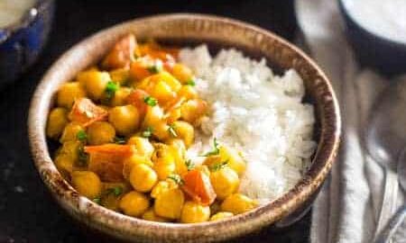 Vegan Chickpea Curry - A gluten free, 20-minute, weeknight dinner that's made extra creamy with coconut milk! It's perfect for a cozy, Meatless Monday meal! | Foodfaithfitness.com | @FoodFaithFit