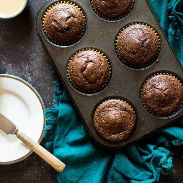 Maple Tahini Chocolate Paleo Muffins - These gluten free chocolate muffins are sweetened with maple syrup and have a hint of tahini. They're a healthy, easy breakfast for busy mornings that are only 170 calories! | Foodfaithfitness.com | @FoodFaithFit