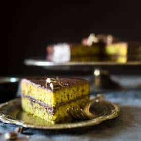 Paleo Mint Chocolate Chip Cake - This gluten free chocolate cake uses a secret ingredient so it's oil, butter and dye-free! You'd never know it's a healthy, holiday treat that is perfect for Christmas! | Foodfaithfitness.com | @FoodFaithFit