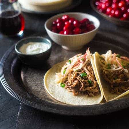 Gluten Free Cranberry, Apple Chipotle Slow Cooker Pork Tenderloin Tacos - These healthy tacos are packed with spicy-sweet, fall flavor and are an easy, weeknight meal that the whole family will love! | Foodfaithfitness.com | @FoodFaithFit