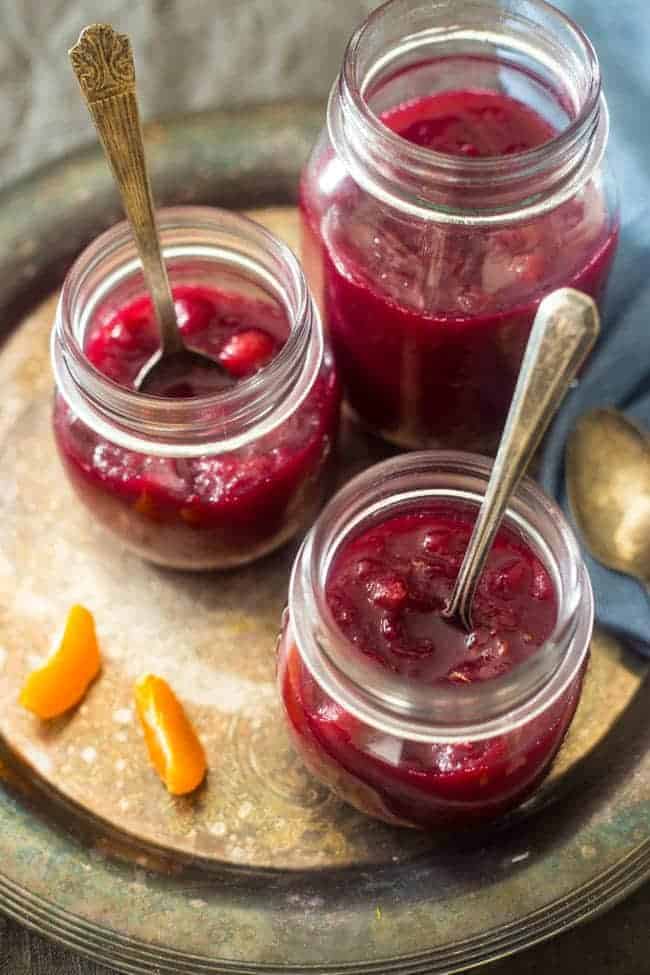 Paleo Maple Orange Cranberry Sauce - This healthy, homemade cranberry sauce uses only 3 ingredients and is Paleo friendly and refined- sugar free! It's ready in 30 minutes and is perfect for Thanksgiving! | Foodfaithfitness.com| @FoodFaithFit