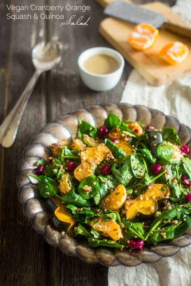 Vegan Maple Tahini Orange Roasted Acorn Squash and Cranberry Quinoa Salad - This healthy salad is mixed with maple roasted acorn squash, cranberries and oranges for a fall meal that is gluten free and vegan friendly. Perfect for Thanksgiving of Friendsgiving! | Foodfaithfitness.com | @FoodFaithFit