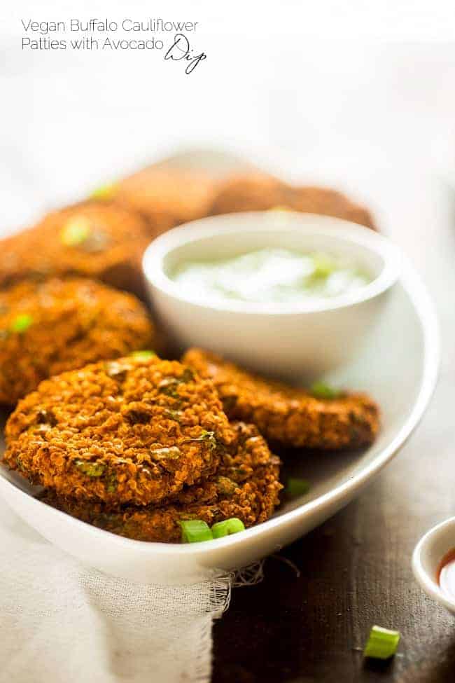 Vegan Buffalo Patties with Avocado Dip - These patties taste just like buffalo chicken, but they're totally meat free and made with cauliflower and quinoa! They're a spicy, crunchy and creamy appetizer for game day! | Foodfaithfitness.com | @FoodFaithFit