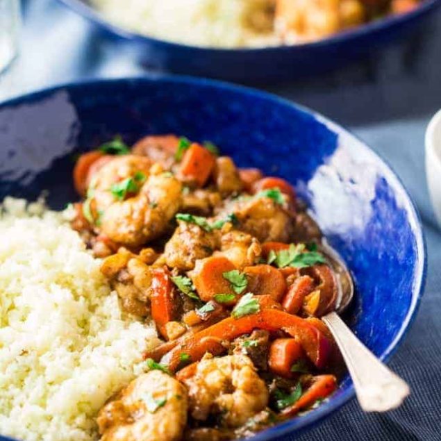 Whole 30 Jerk Shrimp Stew with Cauliflower Rice - This creamy stew uses coconut milk, pineapples and bold flavors for a healthy, 30 minute weeknight meal that is paleo friendly and whole 30 compliant! | Foodfaithfitness.com