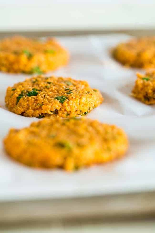 Vegan Buffalo Patties with Avocado Dip - These patties taste just like buffalo chicken, but they're totally meat free and made with cauliflower and quinoa! They're a spicy, crunchy and creamy appetizer for game day! | Foodfaithfitness.com | @FoodFaithFit